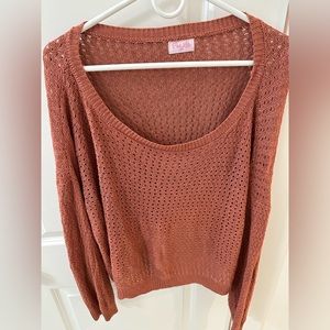 Rust orange holy sweater